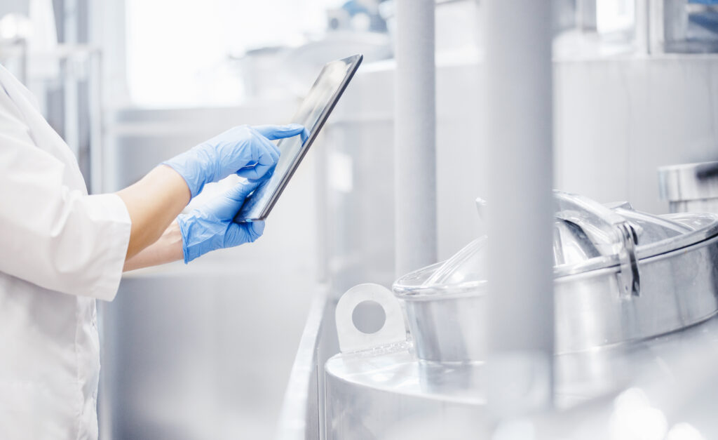 Operator,Uses,Tablet,Computer,To,Check,Quality,And,Temperature,Of