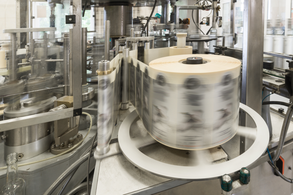 Automatic,Labeling,Machine,During,Operation.,Factory,For,The,Production,Of